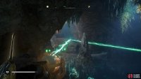 Shine the light beam at each orb to create the crack in the rock beneath the water.