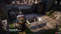 Look for the hole in the ground with a ladder to the northeast of the tower.