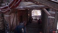 You’ll find fire pots beneath a canopy attached to the tower on its northern side.