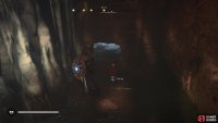 Take the fire pot and slide under the hole to the other side with it.