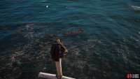 Jump off the cross into the ocean to find the treasure below.