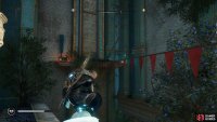 Jump to the banner from the lamp post and then follow the banner to the chest.