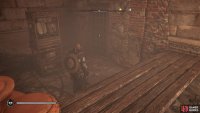 Smash the crates and pots and then move the barricade to reveal the gate.
