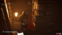 Move the barricade to expose a hole in the wall.