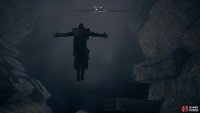 Jump into the body of water at the bottom of the chamber.