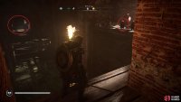You’ll find fire pots on the western side of the open room, which you can use to destroy the blockade on the other side.