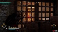 Shoot the lock on the back of the door to enter the room with the naval chain mechanism.