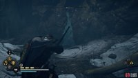 Shoot the ice sheet and head through the crack in the wall.