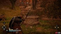 Shoot the wooden planks atop the well and then jump down to find the artifact.