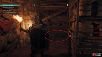 Slide under the hole in the wall to find a fire pot.