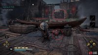 Use the fire pots scattered around to destroy the second palisade.