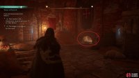 Take the key from behind the wall to open the door to the sanctum.