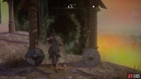 Once you’re at the top, head through the archway surrounded by wooden shields.