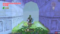 To avoid the Walltulas, sky-dive to the canopy above the treasure chest, then drop down to the top of the vines.
