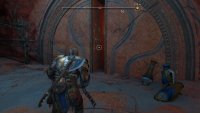 You can enter the next room through the gap in the wall.