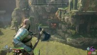 For the second pile of rocks you’ll need to toss the Leviathan Axe at a spot just to the left of the wall,