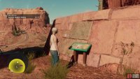 then follow the path downhill to reach a fork. Turn left to find a sign near some stonework under a natural arch,