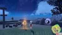 the orange stake is overlooking the nearby ruins.