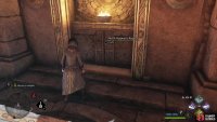 To leave, search the wall behind the sarcophagus.