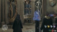 Cast Revelio in front of the hourglasses to reveal the page.