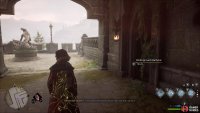 Go through the door to the right of the Werewolf statue.