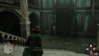 Go through the dark green door to enter the Greenhouses.