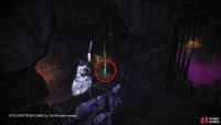 Head into the adjoining cell and jump through the hole in the wall.
