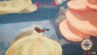 Look for the large cavern underneath the water