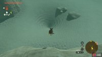 Jump into this sand pit to get to the ruins underneath.