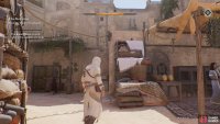 Use the crates near the pharmacy’s northern side to break in.