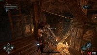 You need to get on this wooden platform and activate the lever to move to the second half of the Sunless Mine.