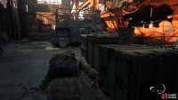 then hide in a container inside the Hangar and take out the guard who’s leaning against a box.