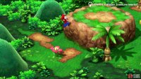 Use a flower to propel yourself onto high ground to the east,
