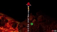 Return to the area and jump in the lava to get propelled up to the ledge with the Frog Coin.