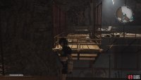 To knock down the ladder, climb up to this spot to get a good shot on the rope.