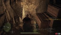 The sixth and final pile of Scalecinder is hidden under some crates along the western edge of the platform chamber.