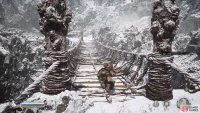 Cross the bridge to the right of the Snow-Veiled Trail in the Pagoda Realm.