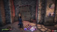 Search the lower floor of the ruined building near the beacon to find a boarded up door leading to the cellar.