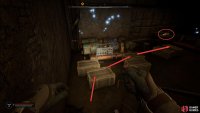 Jump across the crates to the backpack to avoid getting electrocuted.