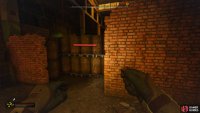 Head past the anomalies until you reach the pallets of metal drums.