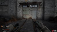 Enter the main base via the white door to the left of the tunnel.