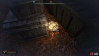 The Inductor will be in the backpack behind the crates.