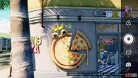 You need a picture of the pizza statue on the wall.